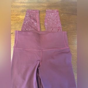 Beautifully designed Lululemon leggings size 4 full length Burgundy in color